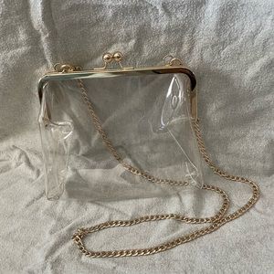 Clear purse with gold hardware